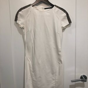 Shoulder embellished white dress